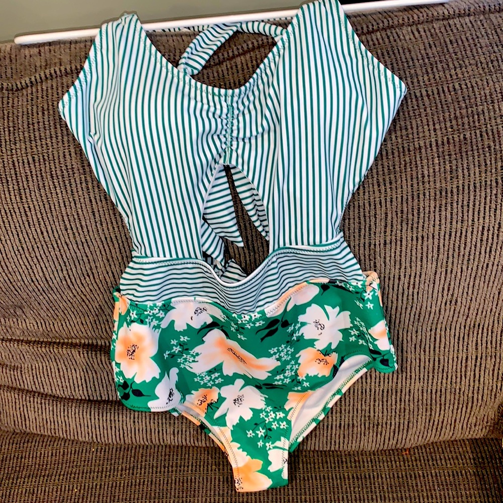 NEVER WORN One piece bathing suit- good bottom coverage!
